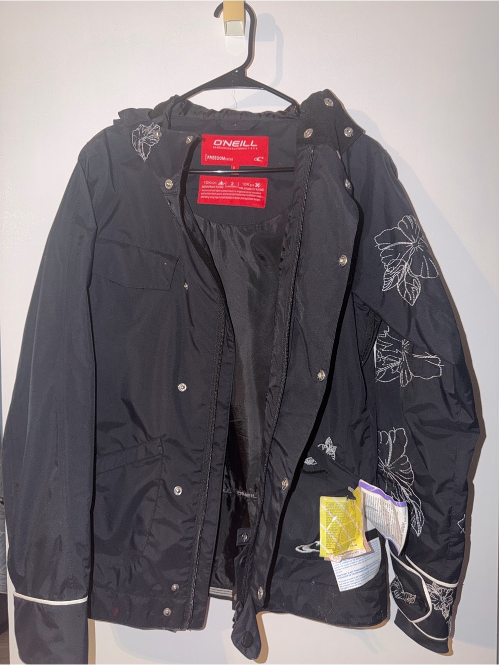 O'Neill Black Hooded Ski Jacket with White Floral Accents